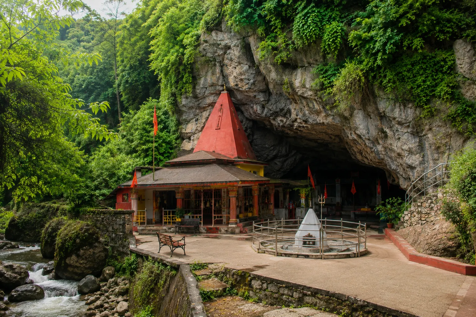 Tapkeshwar Mahadev Temple and surrounding landscape in Dehradun